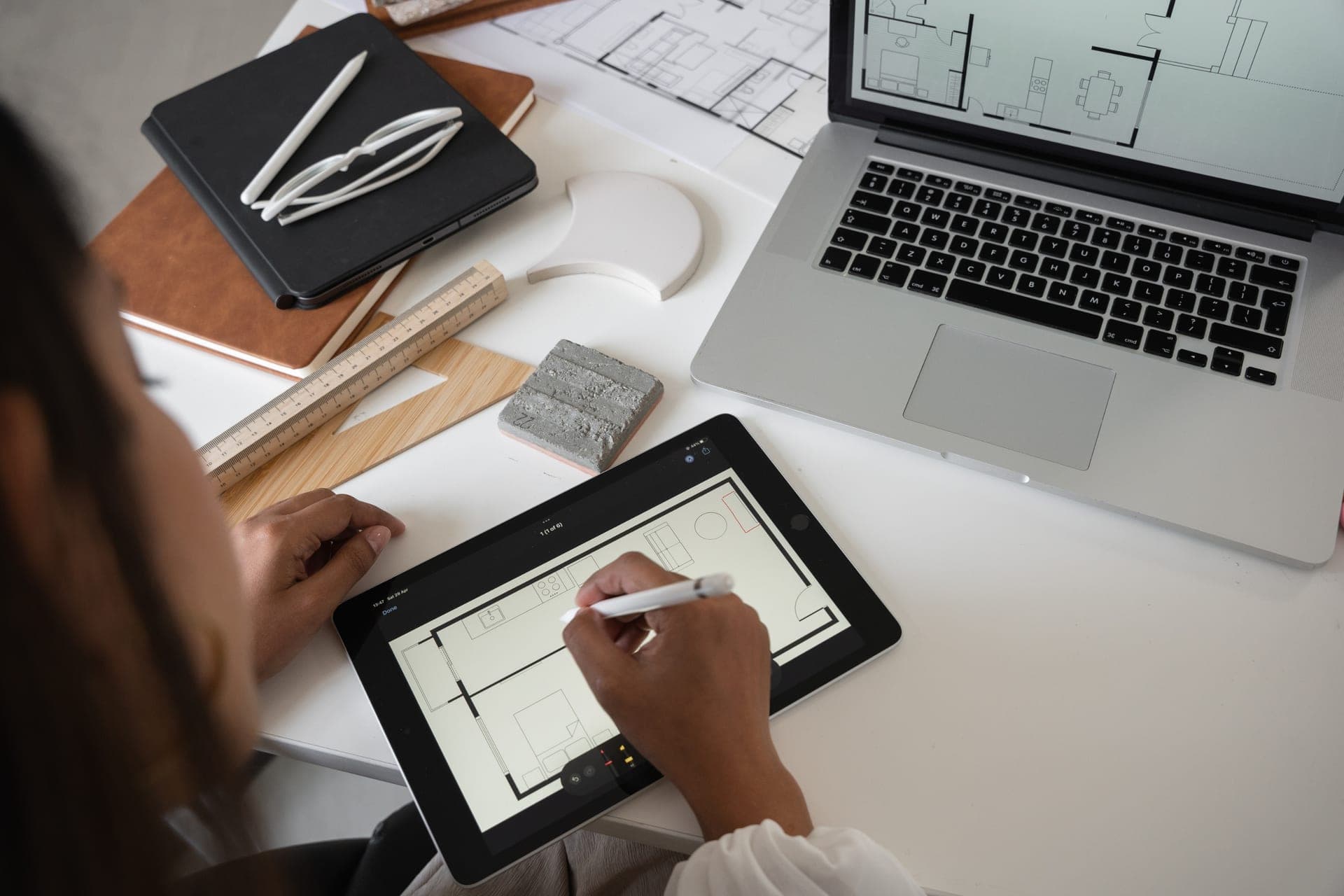 Realtor reviewing listing marketing content at their desk